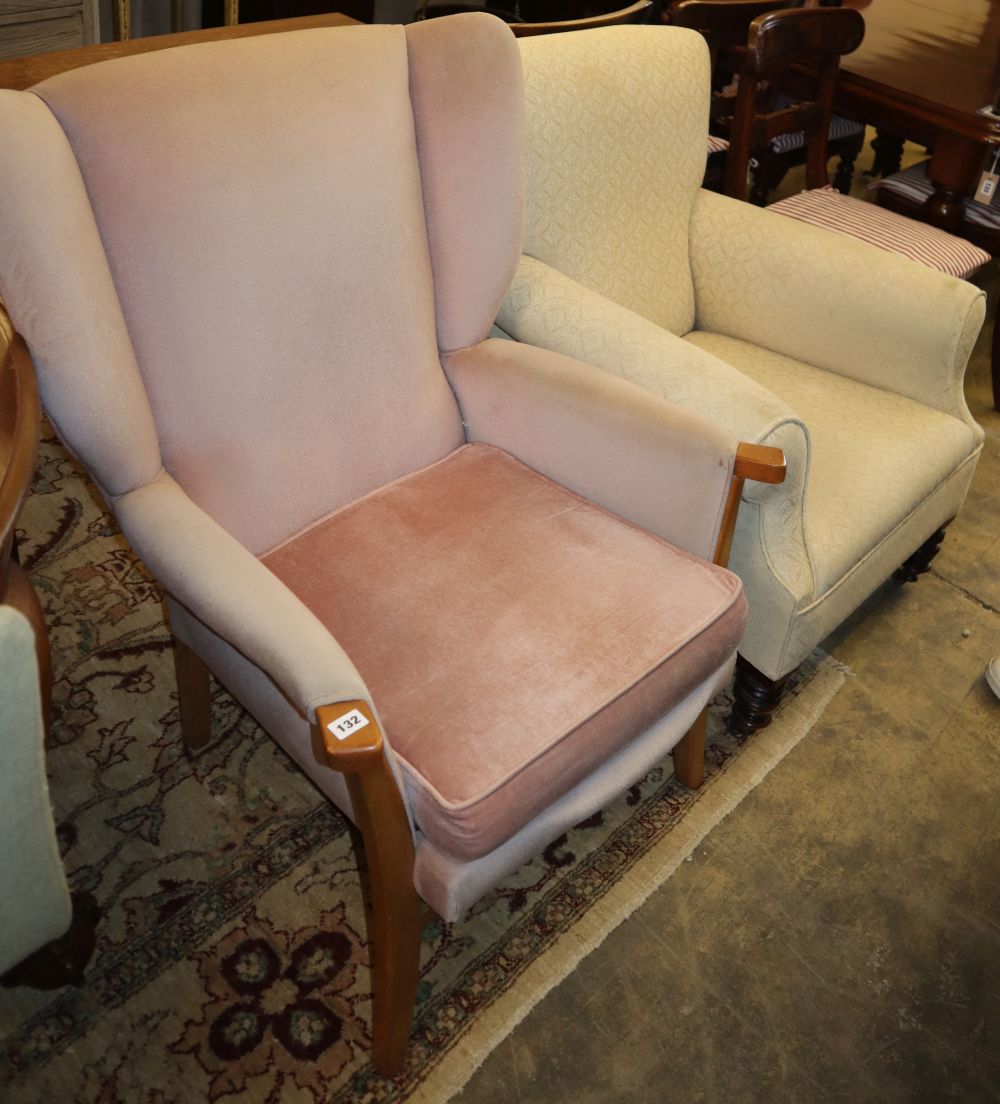 A late Victorian upholstered armchair and a mid century upholstered Parker Knoll type armchair